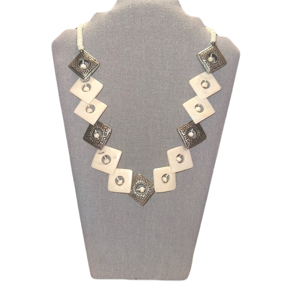 Vintage necklace w/ cream square, diamond-shaped bone and metal pendants